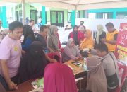 Sambut HUT Bhayangkara Ke-79, Polres Touna Gelar Pemeriksaan Kesehatan Gratis di Taman Jembatan Hayal