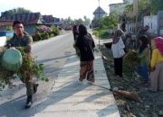 Satgas Madago Raya Bersama Pelajar MAN 1 Poso Kerja Bakti