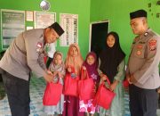 Satgas Madago Raya Berikan Sembako dan Alat Tulis ke Panti Asuhan Nur Riski Rahmat