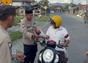 Polres Touna Gelar Program Jumat Berkah di Muara Toba