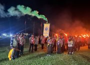Peringati HUT ke-18 Saka Wira Kartika, Anggota Gerakan Pramuka Touna Gelar Pawai Obor